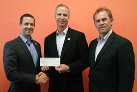 Photo of check presentation to the National Multiple Sclerosis Society